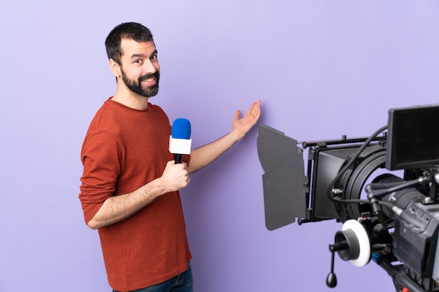 Reporter Man posing holding a microphone and reporting news