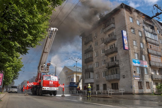 The rescue service extinguishes a fire in the city