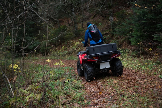 Rescuer on Atv in Woods Search Missing Person