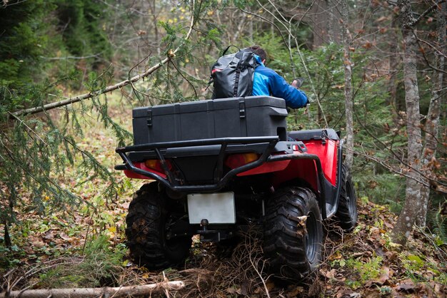 Rescuer on Atv in Woods Search Missing Person