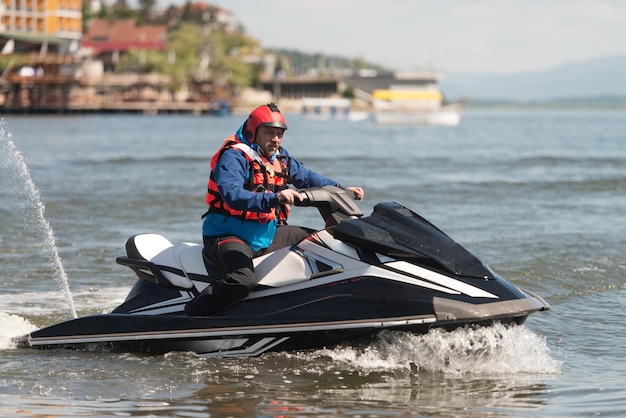 Rescuer Doing Lookout on Ocean by Jet Ski