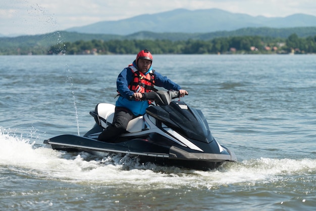 Rescuer on a Jet Ski Searching Missing Person