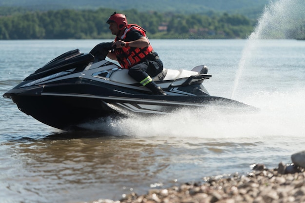 Rescuer Searching Lake Area by Atv Jet Ski