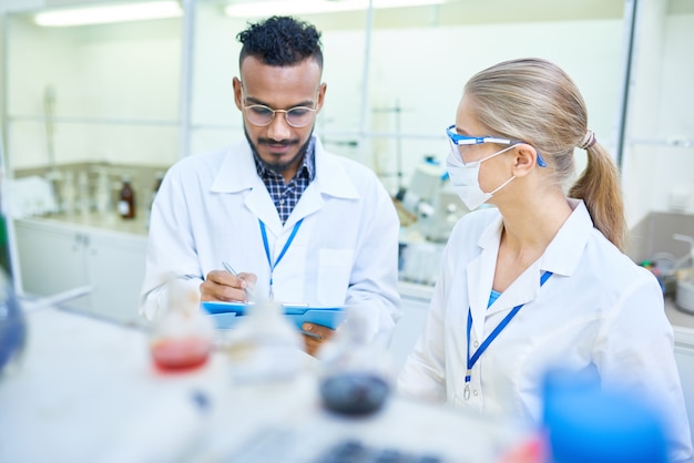 Research Scientists Working in Laboratory