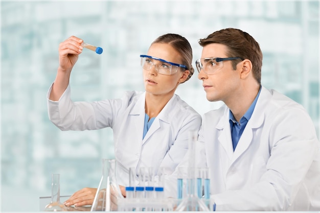 Researcher and doctor looking at a molecular structure