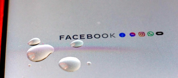 RESEN MACEDONIA MARCH 27 2023 Logos of facebook instagrammessenger whatsapp on a smartphone display with waterdrops