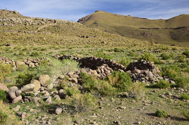 Residential area with a hotel built of salt on the rocks in the middle of Salar de Uyuni Bolivia