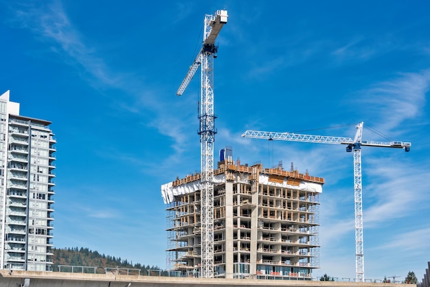 Residential building under constraction on blue sky background