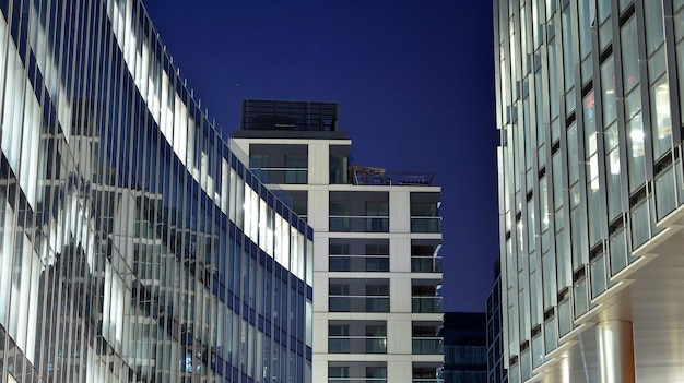 Residential building on sky background facade of a modern housing construction with of balconies