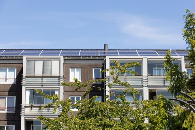 Residential building with new roof and solar panels