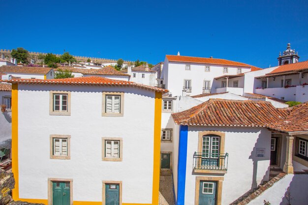 Residential buildings against blue sky