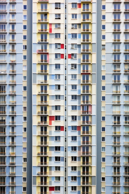 Residential complex building facade with many windows texture