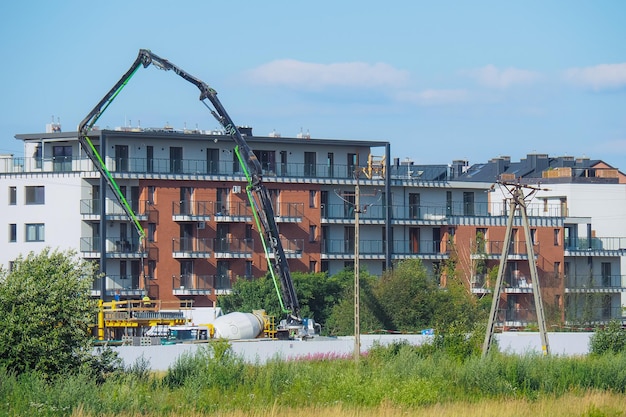 Photo residential construction and crane at site work