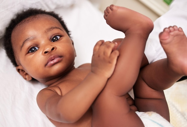 The resilience of a child is admirable Shot of a little baby at a checkup with a doctor at a clinic