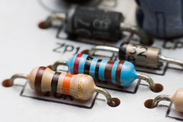 Resistor, Capacitor and Diode on Circuit Board close up. electronic hardware