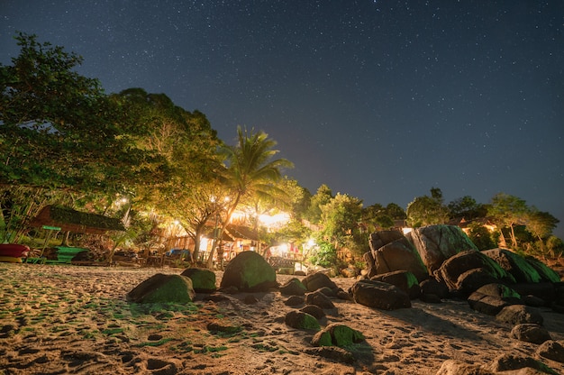 Resort illumination on the beach with stars