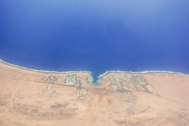 resort for tourists on the shore in egypt view during a flight