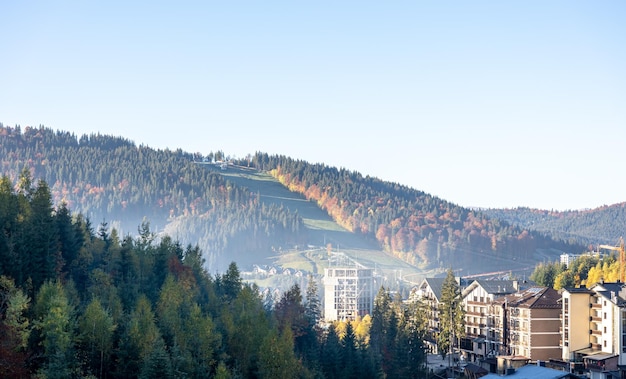 Resort town with hotels in the mountains autumn landscape