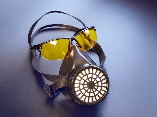 Respirator and yellow glasses