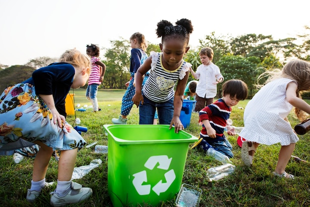 Responsible group of kids cleaning at the park