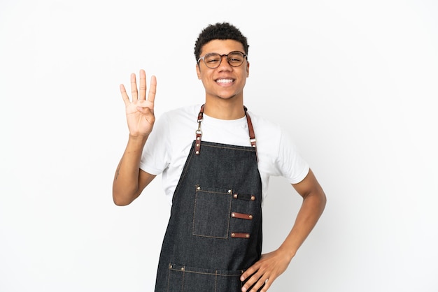 Restaurant African American waiter man isolated on white background happy and counting four with fingers