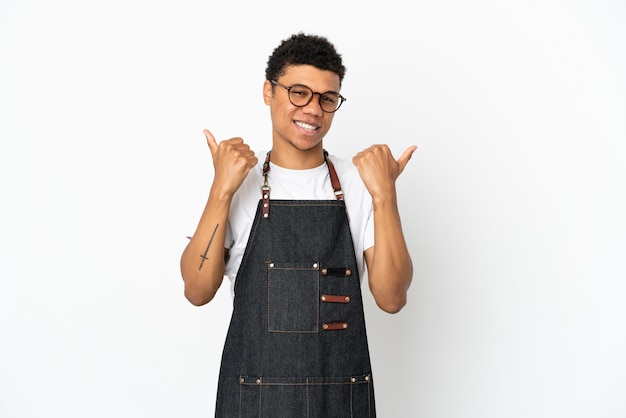 Restaurant African American waiter man isolated on white background with thumbs up gesture and smiling