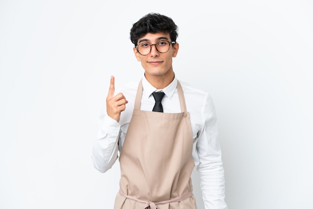 Restaurant Argentinian waiter isolated on white background pointing with the index finger a great idea