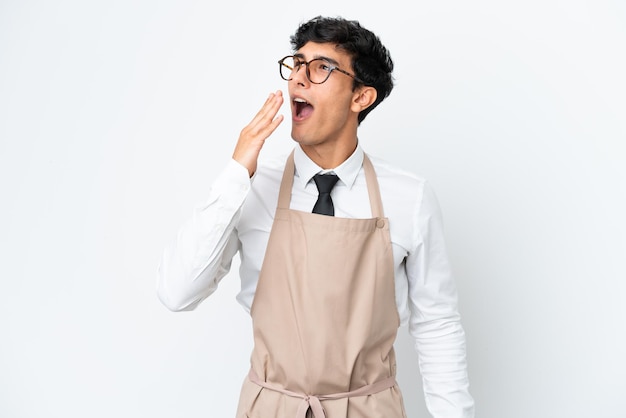 Restaurant Argentinian waiter isolated on white background yawning and covering wide open mouth with hand