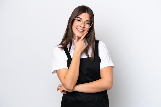 白い背景の笑顔に分離されたレストラン ブラジルのウェイターの女性
