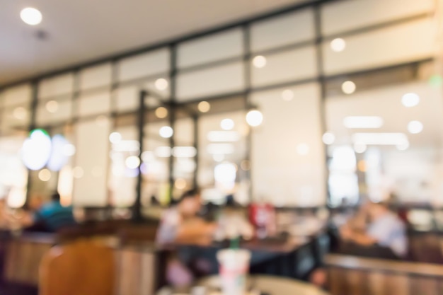 Restaurant cafe or coffee shop interior with people abstract defocused blur background