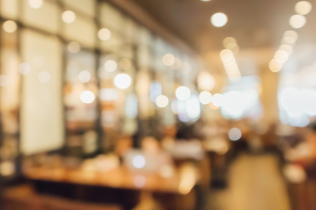 Photo restaurant cafe or coffee shop interior with people abstract defocused blur background