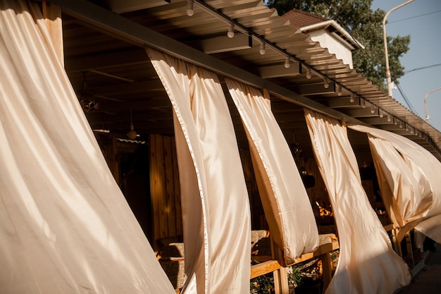 Restaurant closed without people curtains develop at sunset