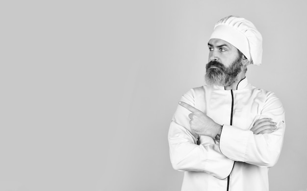 Restaurant cuisine concept Preparation and culinary concept culinary and cuisine Healthy food cooking bearded man chef uniform Bearded man cooking in kitchen Professional chef in cook uniform