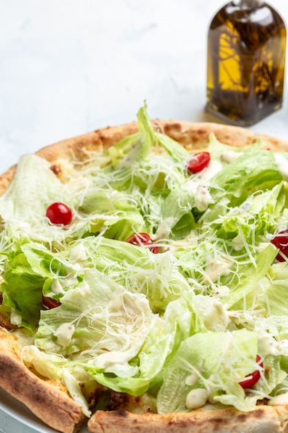 Restaurant pizzeria menu with delicious taste pizza Caesar with chicken, parmesan, egg, cherry tomatoes and fresh lettuce