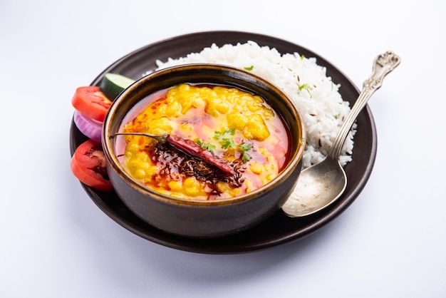 Restaurant style Dal Tadka tempered with ghee and spices! This recipe makes a great meal with boiled rice