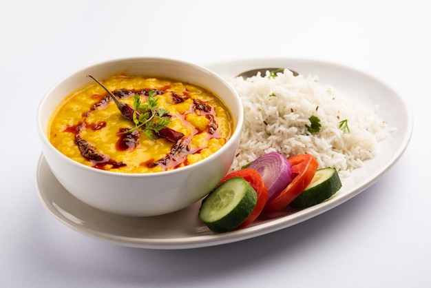 Restaurant style Dal Tadka tempered with ghee and spices! This recipe makes a great meal with boiled rice