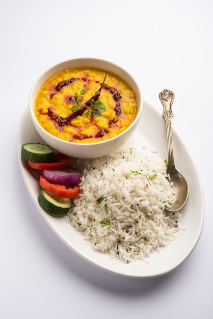 Restaurant style Dal Tadka tempered with ghee and spices! This recipe makes a great meal with boiled rice