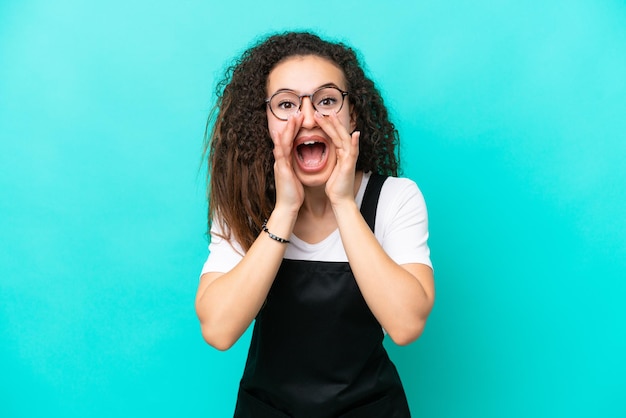 Restaurant waiter Arab woman isolated on blue background shouting and announcing something