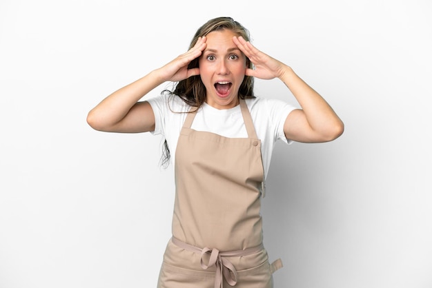 Restaurant waiter caucasian woman isolated on white background with surprise expression