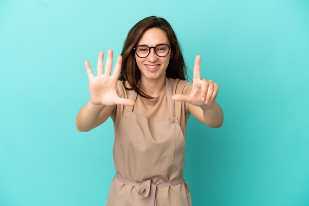 Restaurant waiter counting seven with fingers