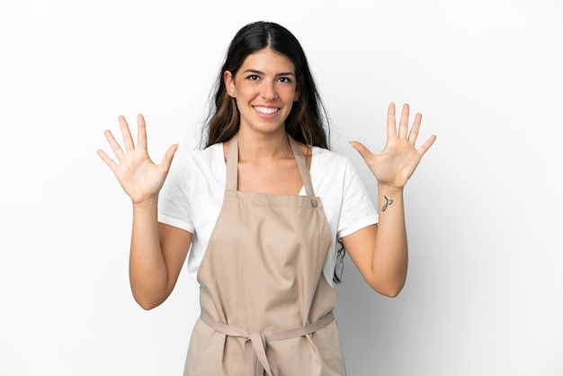 Restaurant waiter over isolated white background counting ten with fingers