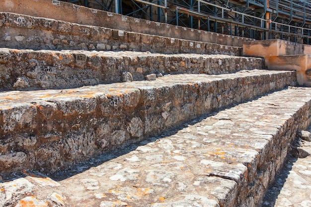 The restored ancient amphitheater with stone seats