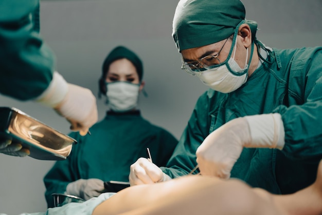 Resuscitation medical team perform surgical operation in operating room