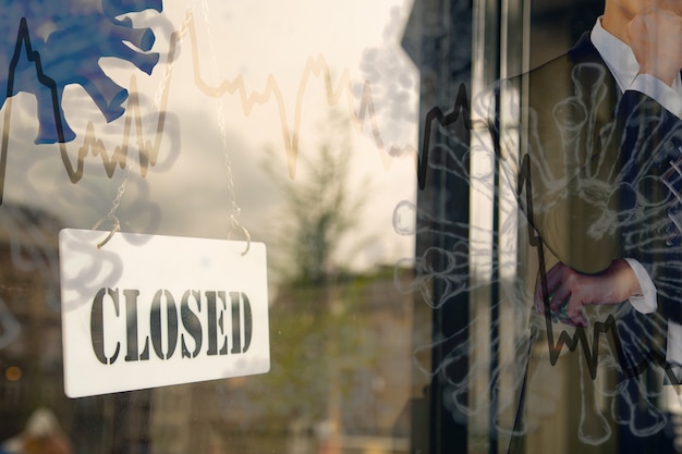 Photo retail bankruptcy store closed because of prevent covid-19 with sign board