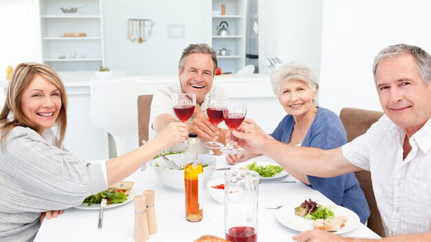 Retired friends toasting together