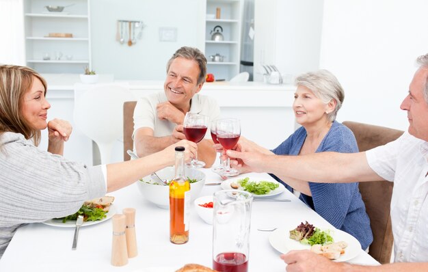 Retired friends toasting together