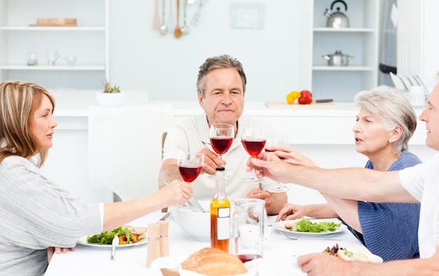 Retired friends toasting together