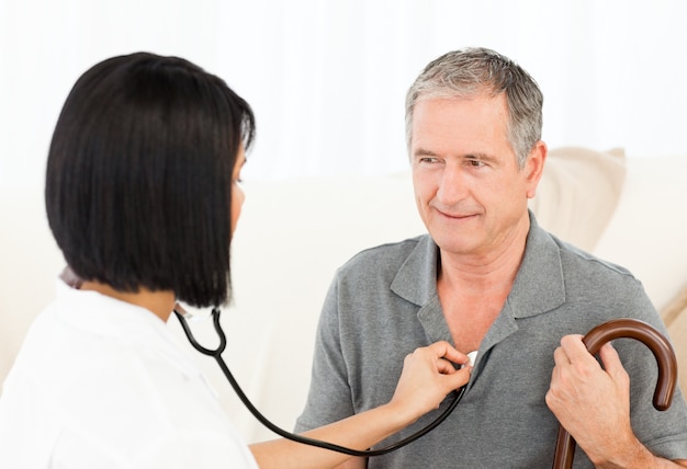 Retired man with his nurse