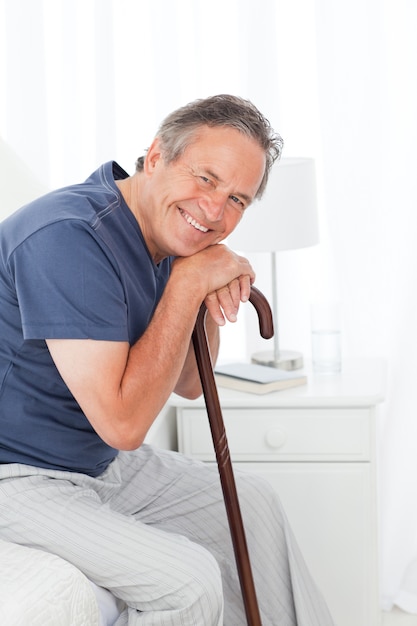 Retired man with his walking stick