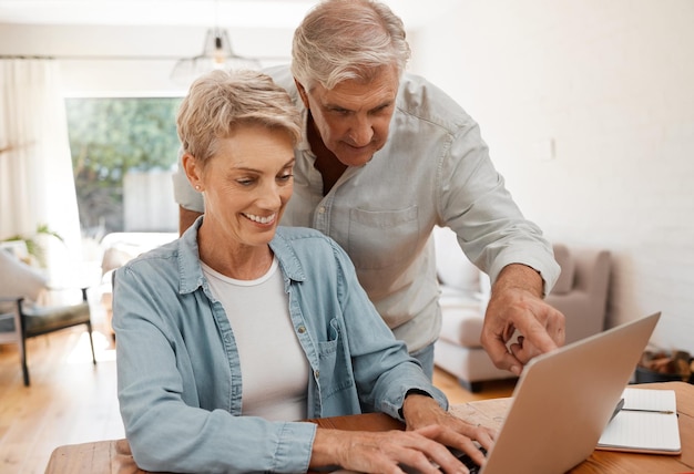 Retirement senior couple and ecommerce on laptop for home purchase finance decision together Happy married people with financial choice for online shopping payment with wireless technology